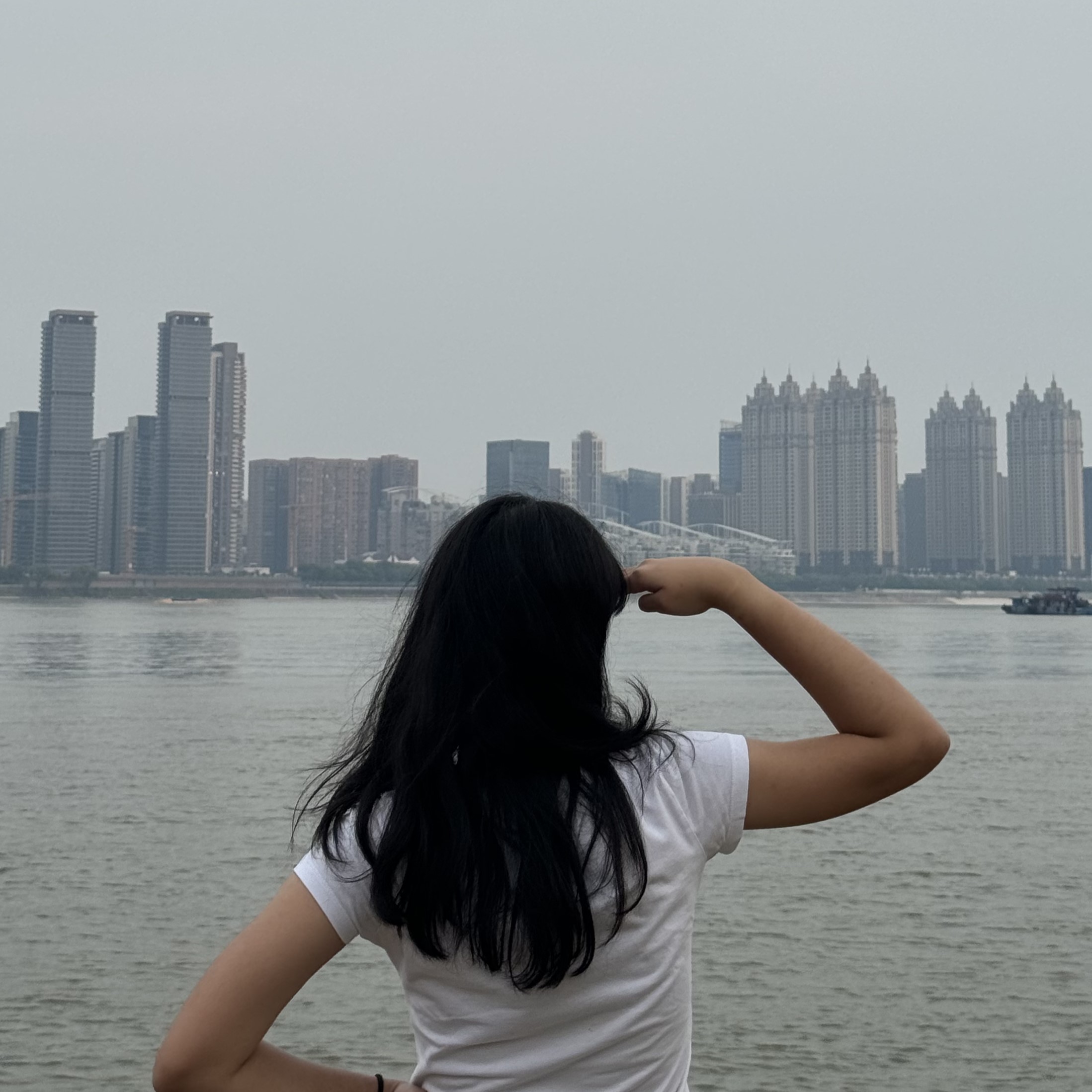 A back shot of Sarah looking at faraway